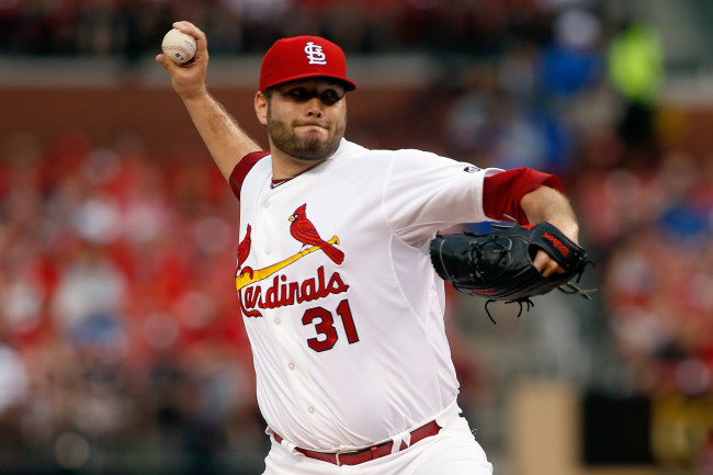 St. Louis Cardinals starting pitcher Lance Lynn throws during the first inning of a baseball game against the Cincinnati Reds, Monday, July 27, 2015, in St. Louis. (AP Photo/Scott Kane)